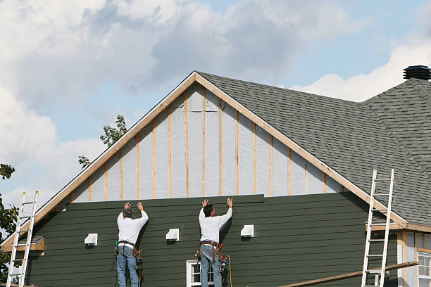 Professional Emergency Siding Repair technician working in Duncan Falls, OH